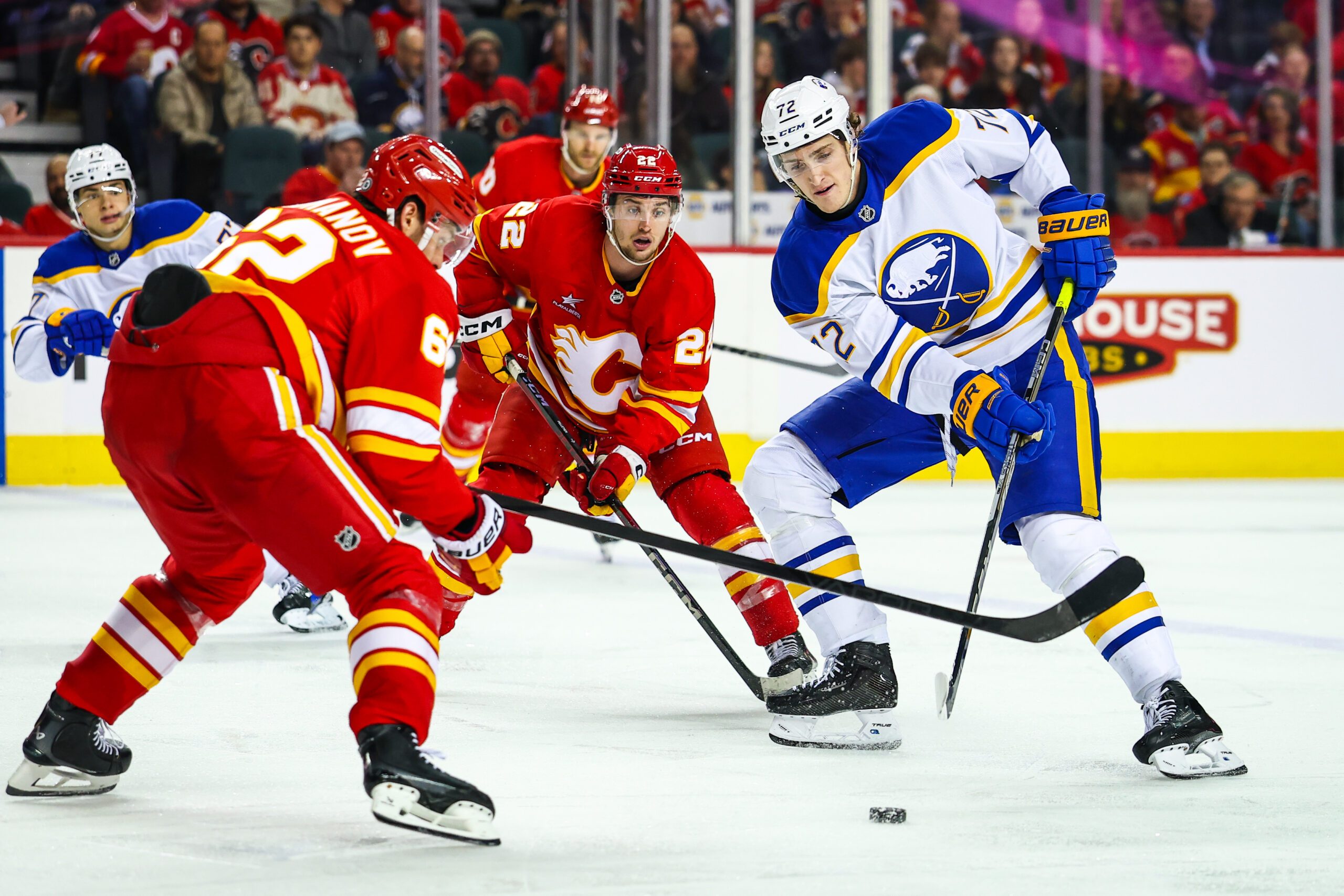 Jan 23, 2025; Calgary, Alberta, CAN; Buffalo Sabres center Tage Thompson (72) controls the puck against the Calgary Flames during the third period at Scotiabank Saddledome. Mandatory Credit: Sergei Belski-Imagn Images