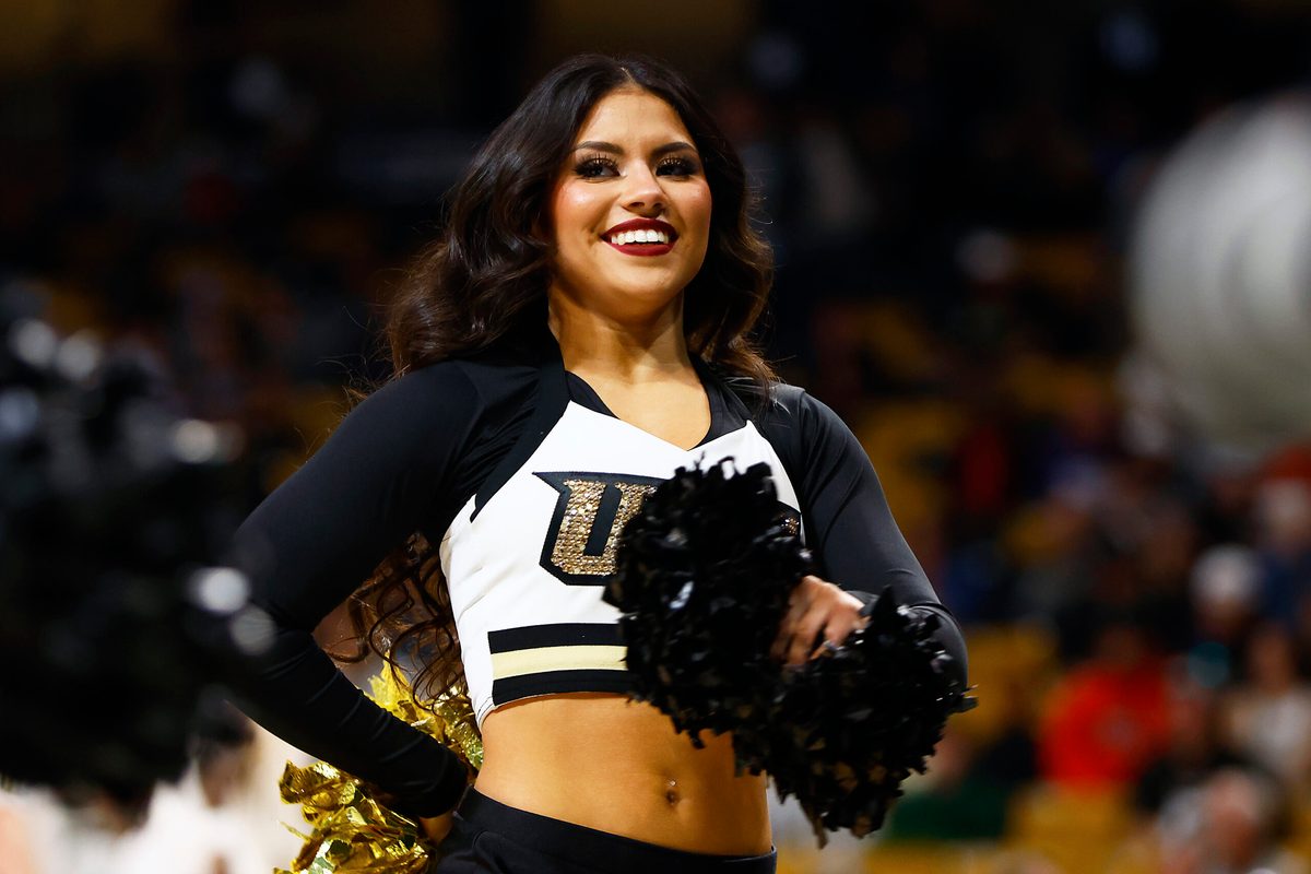 Jan 25, 2025; Orlando, Florida, USA;  A Central Florida Knights cheerleader performs during a game against the Texas Christian Horned Frogs at Addition Financial Arena. Mandatory Credit: Russell Lansford-Imagn Images