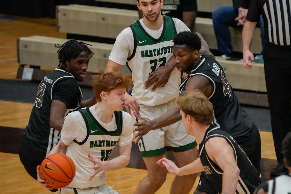 Brown falls to Dartmouth 84-83 at Pizzitola Sports Center. Dartmouth's Ryan Cornish, with ball, made late game free throw to put them ahead.