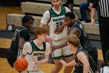 Brown falls to Dartmouth 84-83 at Pizzitola Sports Center. Dartmouth's Ryan Cornish, with ball, made late game free throw to put them ahead.