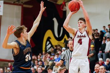 De Pere High School's Zach Kinziger (4) shoots a 3-pointer over Sheboygan North High School's Tyler Konrad (31) on Thursday, January 30, 2025, at De Pere High School in De Pere, Wis. De Pere won the game, 74-45.
Tork Mason/USA TODAY NETWORK-Wisconsin
