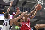 Feb 6, 2025; Spokane, Washington, USA; Loyola Marymount Lions forward Aaron McBride (16) rebounds against Gonzaga Bulldogs forward Ben Gregg (33) in the second half at McCarthey Athletic Center. Gonzaga Bulldogs won 73-53. Mandatory Credit: James Snook-Imagn Images