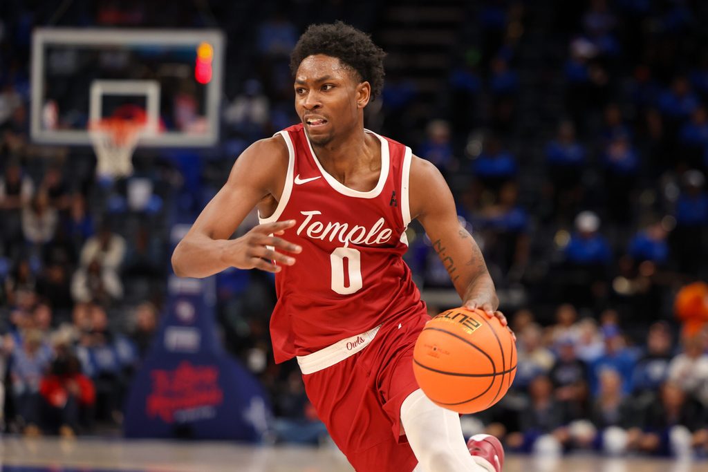 Feb 9, 2025; Memphis, Tennessee, USA; Temple Owls guard Quante Berry (0) drives to the basket against the Memphis Tigers during the second half at FedExForum. Mandatory Credit: Wesley Hale-Imagn Images