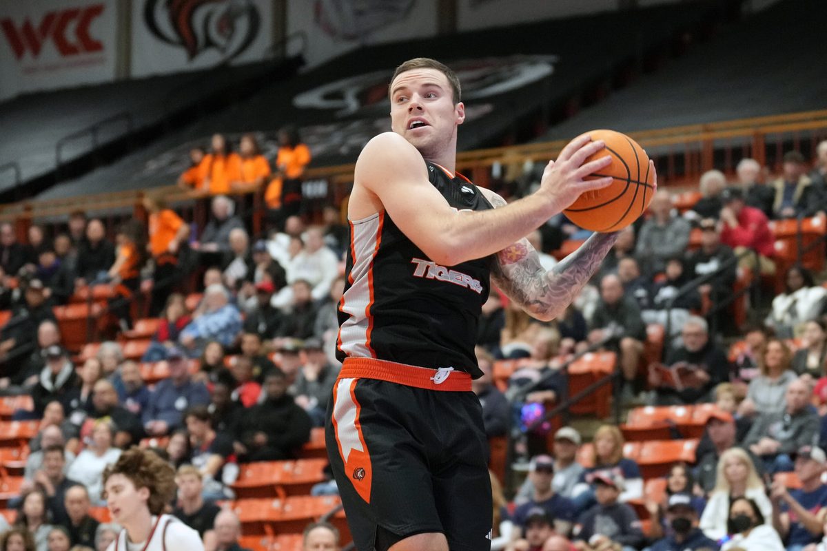 Feb 8, 2025; Stockton, California, USA; Pacific Tigers guard Petar Krivokapic (3) rebounds against the Gonzaga Bulldogs during the second half at Alex G. Spanos Center. Mandatory Credit: Darren Yamashita-Imagn Images