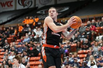Feb 8, 2025; Stockton, California, USA; Pacific Tigers guard Petar Krivokapic (3) rebounds against the Gonzaga Bulldogs during the second half at Alex G. Spanos Center. Mandatory Credit: Darren Yamashita-Imagn Images