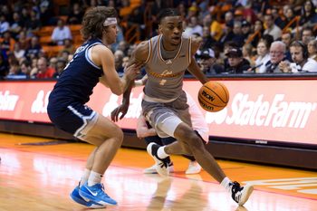 UTEP’s Corey Camper Jr. (4) dribbles the ball during a men's basketball game against Liberty on Saturday, Feb. 15, 2025, at the Don Haskins Center in El Paso, Texas.
