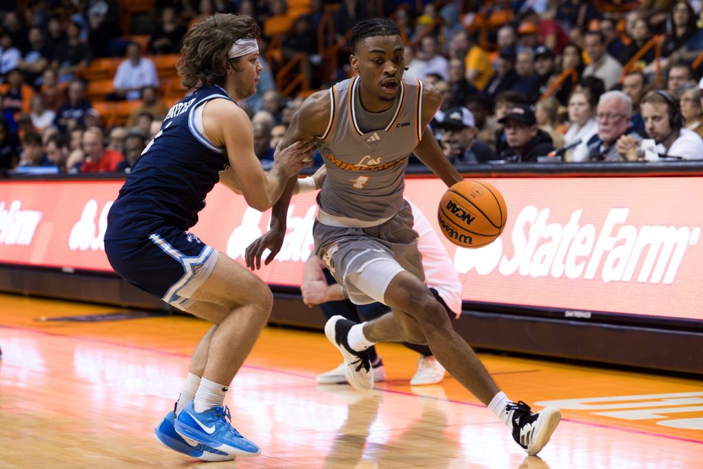 UTEP’s Corey Camper Jr. (4) dribbles the ball during a men's basketball game against Liberty on Saturday, Feb. 15, 2025, at the Don Haskins Center in El Paso, Texas.