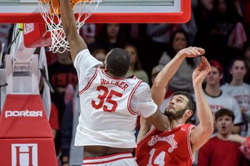 Illinois State's Charles Walker dunks over Bradley's Ahmet Jonovic in the first half of their Missouri Valley Conference basketball game Wednesday, Feb. 19, 2025 at CEFCU Arena in Normal. The Braves fell to the Redbirds 82-71.