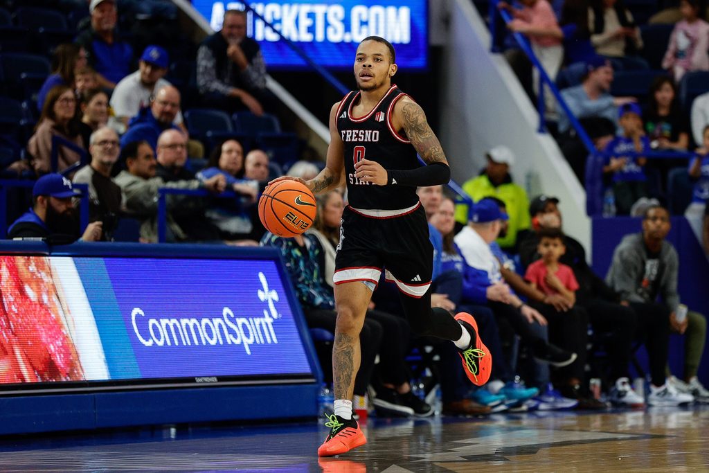 Feb 22, 2025; Colorado Springs, Colorado, USA; Fresno State Bulldogs guard Jasir Tremble (0) dribbles the ball up court in the second half against the Air Force Falcons at Clune Arena. Mandatory Credit: Isaiah J. Downing-Imagn Images