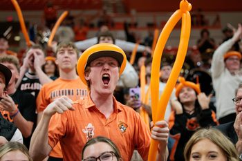 Feb 25, 2025; Stillwater, Oklahoma, USA; Oklahoma State Cowboys fans react during the second half against the Iowa State Cyclones at Gallagher-Iba Arena. Mandatory Credit: William Purnell-Imagn Images