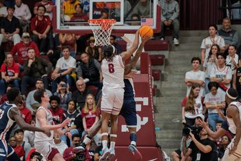 Feb 25, 2025; Santa Clara, California, USA;  Gonzaga Bulldogs guard Khalif Battle (99) shot is blocked by Santa Clara Broncos forward Elijah Mahi (8) during the second half at Leavey Center. Mandatory Credit: Neville E. Guard-Imagn Images