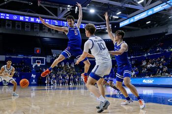 Mar 4, 2025; Colorado Springs, Colorado, USA; Air Force Falcons forward Caleb Walker (10) passes the ball as Boise State Broncos guard RJ Keene II (5) and forward Andrew Meadow (13) defend in the second half at Clune Arena. Mandatory Credit: Isaiah J. Downing-Imagn Images