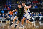 North Dakota Fighting Hawks guard Treysen Eaglestaff (52) brings the ball up court on Friday, March 7, 2025, at Denny Sanford Premier Center in Sioux Falls, S.D.