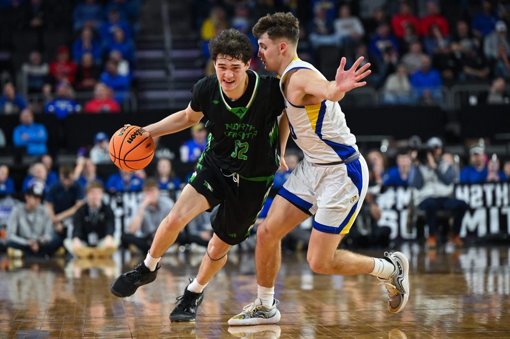 North Dakota Fighting Hawks guard Treysen Eaglestaff (52) brings the ball up court on Friday, March 7, 2025, at Denny Sanford Premier Center in Sioux Falls, S.D.