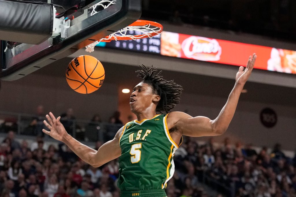 March 10, 2025; Las Vegas, NV, USA; San Francisco Dons guard Tyrone Riley IV (5) dunks the basketball against the Gonzaga Bulldogs during the second half in the semifinal of the West Coast Conference tournament at Orleans Arena. Mandatory Credit: Kyle Terada-Imagn Images