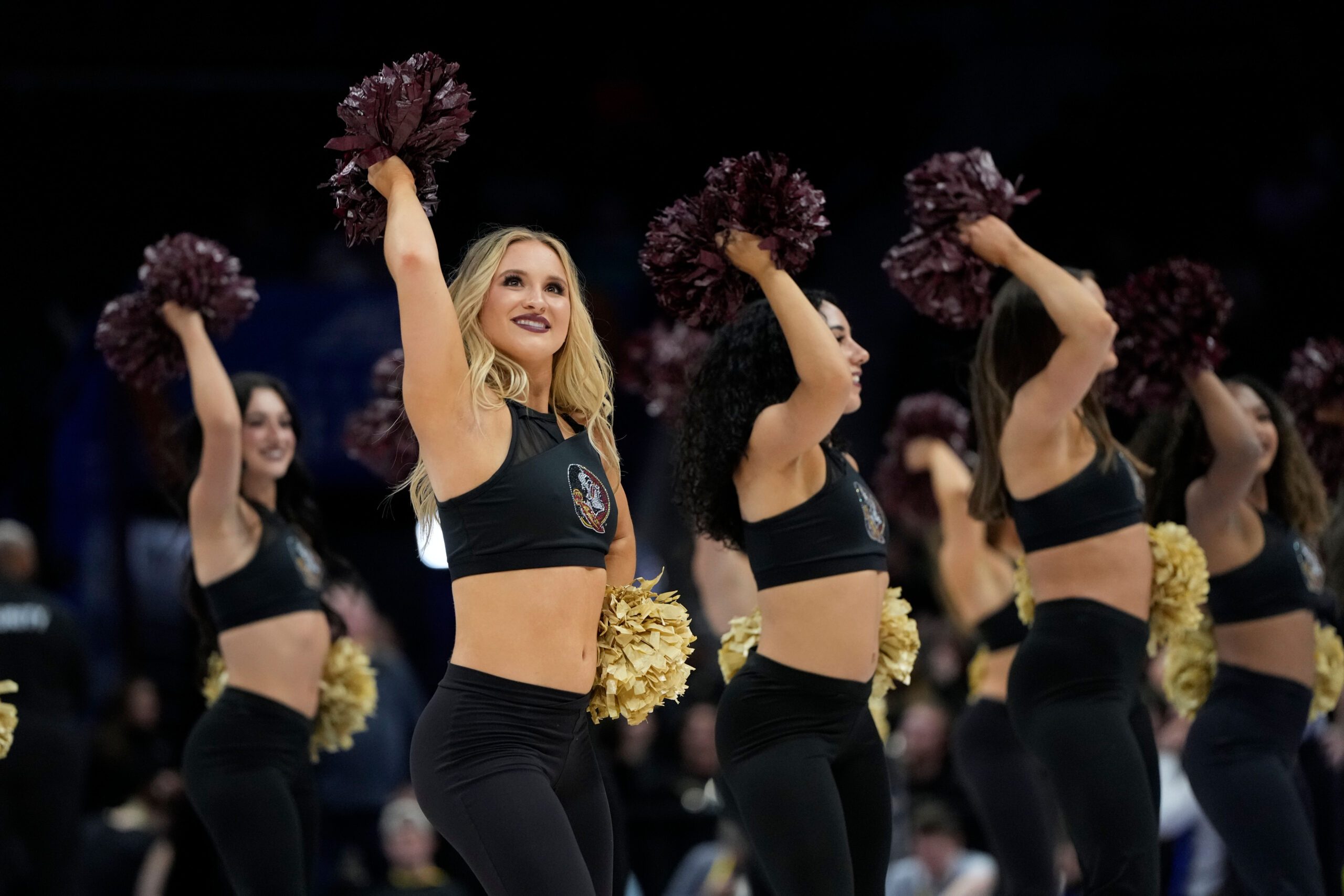 Mar 11, 2025; Charlotte, NC, USA; Florida State Seminoles cheerleaders perform in the first half at Spectrum Center. Mandatory Credit: Bob Donnan-Imagn Images