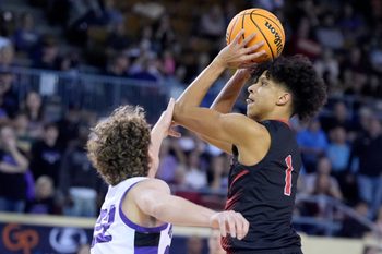 North Rock Creek's Memphis Burdine shoots over Bethany's Garrett Johnson during the Class 4A boys Oklahoma state basketball championship tournament game between Bethany and North Rock Creek at State Fair Arena in Oklahoma City, Wednesday, March, 12, 2025.