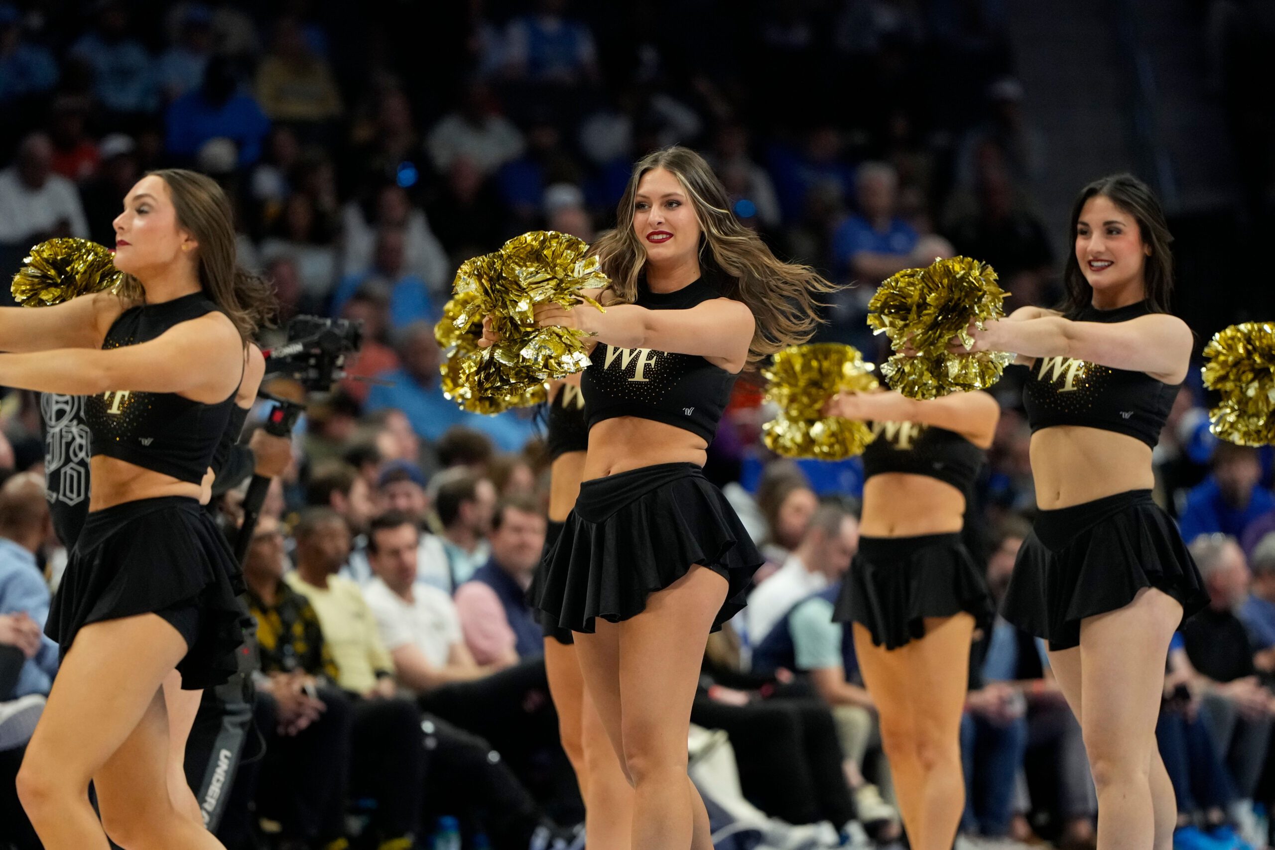 Mar 13, 2025; Charlotte, NC, USA; Wake Forest Demon Deacons cheerleaders perform in the second half at Spectrum Center. Mandatory Credit: Bob Donnan-Imagn Images