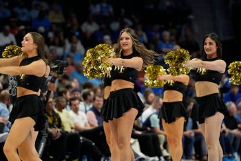 Mar 13, 2025; Charlotte, NC, USA; Wake Forest Demon Deacons cheerleaders perform in the second half at Spectrum Center. Mandatory Credit: Bob Donnan-Imagn Images