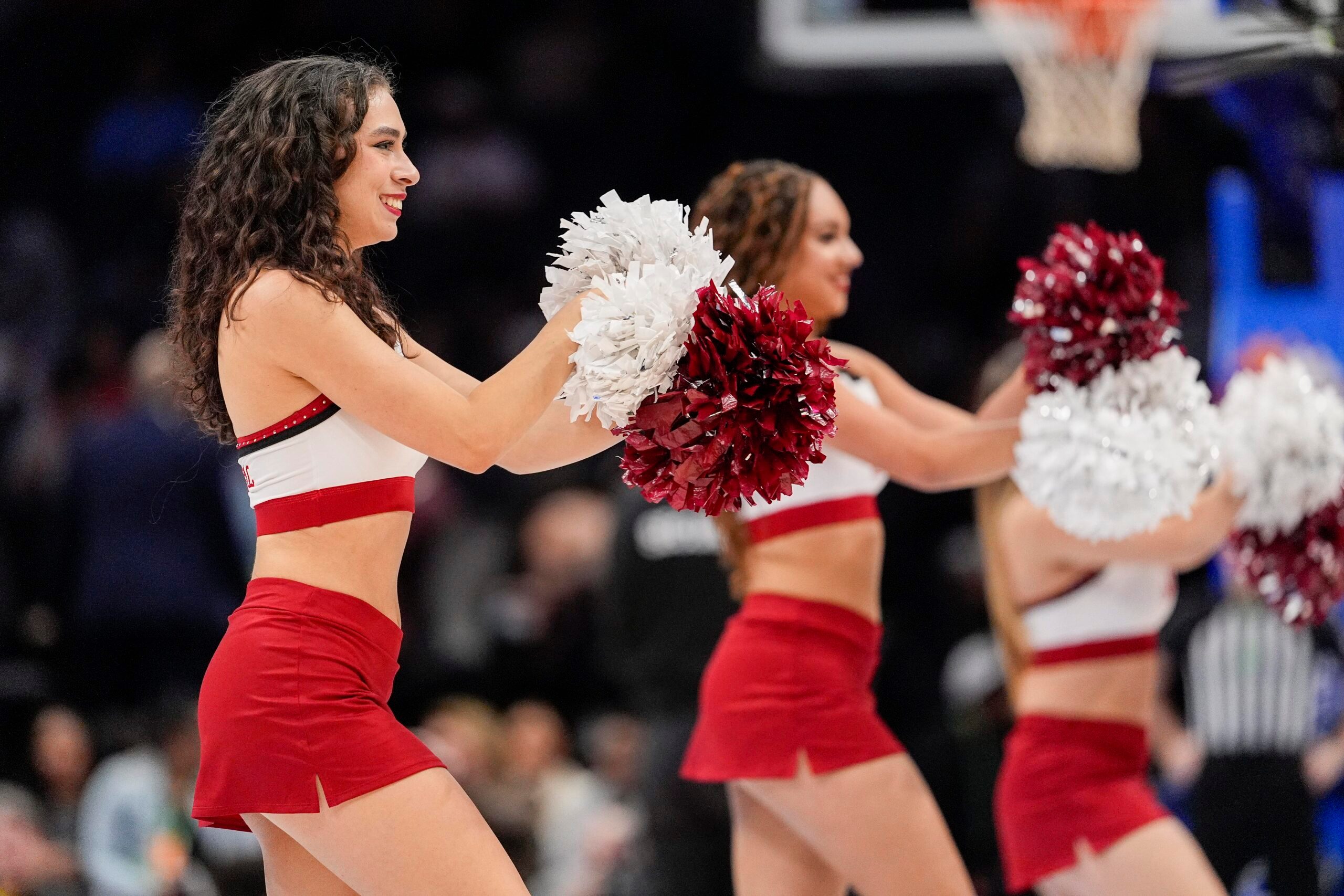 Mar 13, 2025; Charlotte, NC, USA;  Stanford Cardinal cheerleaders perform during the first half against the Louisville Cardinals at Spectrum Center. Mandatory Credit: Jim Dedmon-Imagn Images