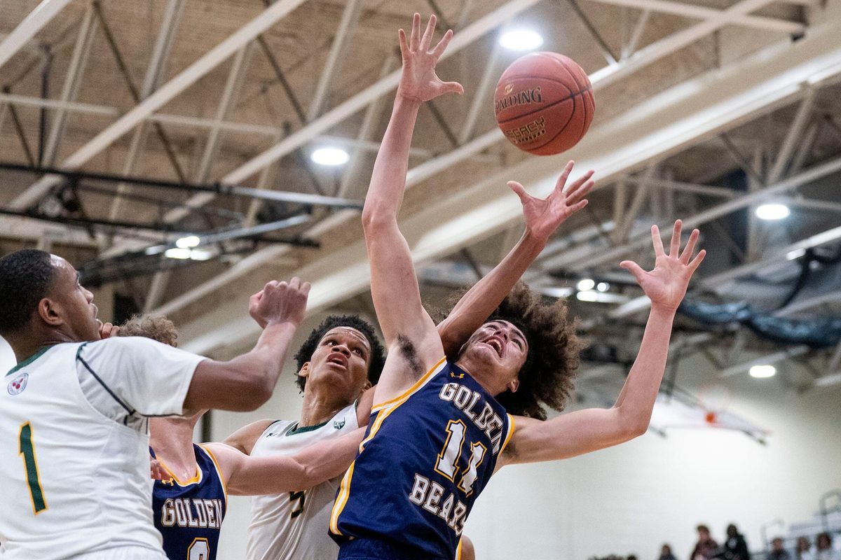 Upper Moreland’s Larry Hughes takes on Bonner-Prendergast’s Aydin Scott for the rebound ball during the PIAA Class 5A boys basketball quarterfinal state playoff game in Norristown on Friday, March 14, 2025.