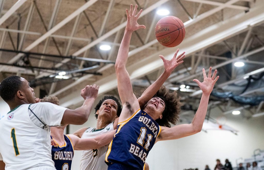 Upper Moreland’s Larry Hughes takes on Bonner-Prendergast’s Aydin Scott for the rebound ball during the PIAA Class 5A boys basketball quarterfinal state playoff game in Norristown on Friday, March 14, 2025.