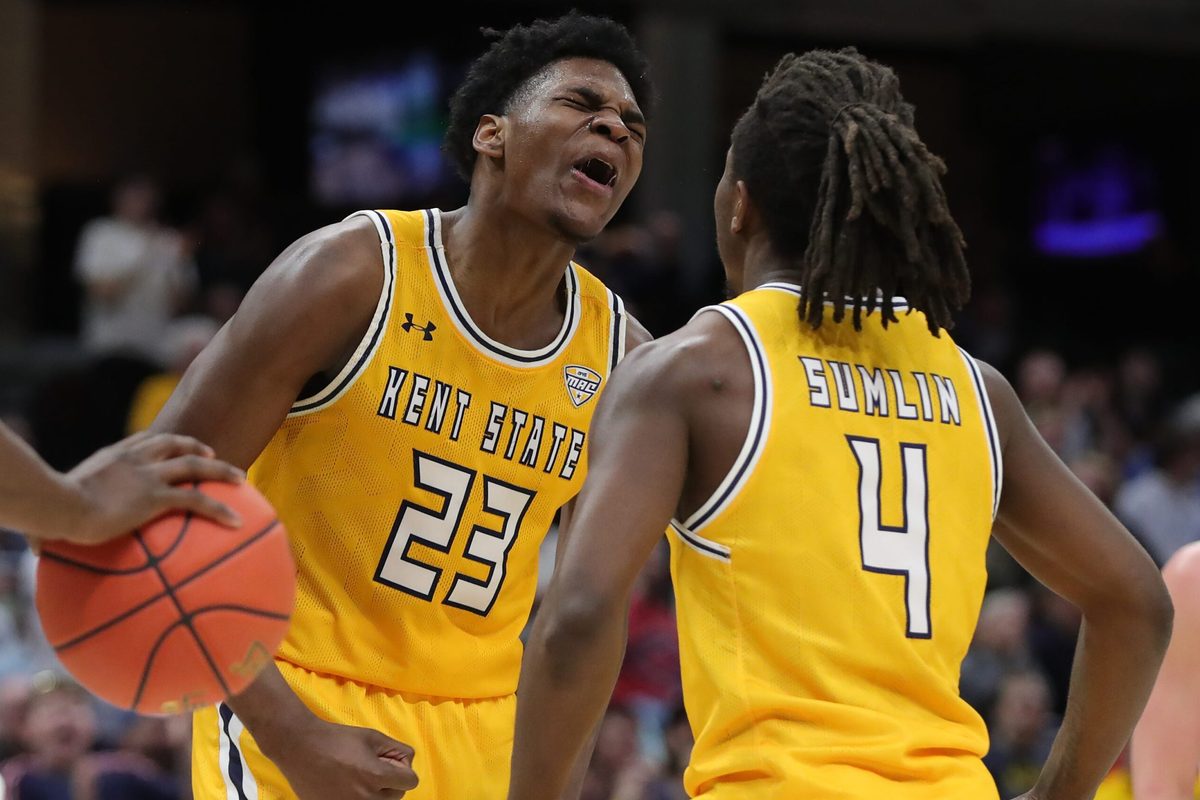 Kent State Golden Flashes forward Delrecco Gillespie (23) celebrates with guard Jamal Sumlin (4) during the second half of an NCAA college basketball game in the semifinals of the Mid-American Conference Tournament at Rocket Arena on Friday, March 14, 2025, in Cleveland, Ohio.