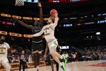 Mar 15, 2025; Washington, D.C., USA; George Mason Patriots guard Brayden O'Connor (4) shoots the ball as Saint Joseph's Hawks forward Rasheer Fleming (13) defends in the second half at Capital One Arena. Mandatory Credit: Geoff Burke-Imagn Images
