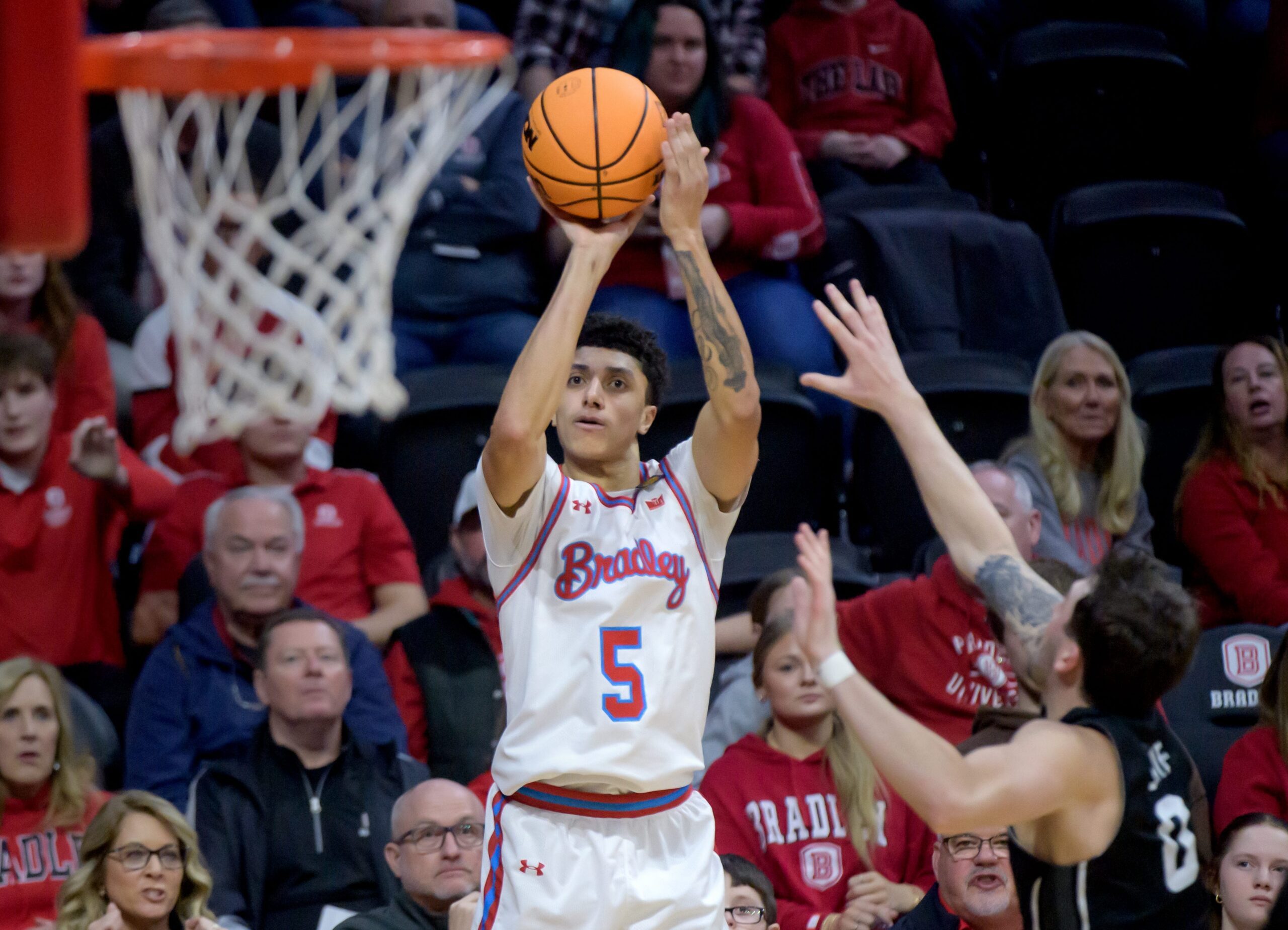 Bradley’s Christian Davis shoots a three-pointer over North Alabama in the second half of their first-round NIT basketball game Wednesday, March 19, 2025. The Braves advanced with a 71-62 victory.