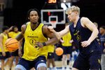 Mar 20, 2025; Cleveland, OH, USA; Marquette Golden Eagles guard Chase Ross (2) and guard Jack Anderson (25) practice during the NCAA Tournament First Round Practice at Rocket Arena. Mandatory Credit: Rick Osentoski-Imagn Images