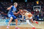 Louisville Cardinals guard J'Vonne Hadley (1) tries to drive around Creighton Bluejays forward Jackson McAndrew (23) during the second half in the first round game of the 2025 NCAA men's basketball tournament at Rupp Arena in Lexington, Kentucky Thursday March 20, 2025.