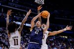 March 20, 2025; Denver, CO, USA; Yale Bulldogs forward Nick Townsend (42) attempts to shoot the ball against the Texas A&M Aggies at Ball Arena. Mandatory Credit: Isaiah J. Downing-Imagn Images