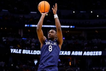 March 20, 2025; Denver, CO, USA; Yale Bulldogs forward Nick Townsend (42) attempts to shoot the ball against the Texas A&M Aggies at Ball Arena. Mandatory Credit: Isaiah J. Downing-Imagn Images