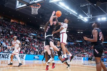 Mar 20, 2025; Providence, RI, USA;  Omaha Mavericks guard Tony Osburn (32) controls the ball during the second half against the St. John's Red Storm at Amica Mutual Pavilion. Mandatory Credit: Gregory Fisher-Imagn Images