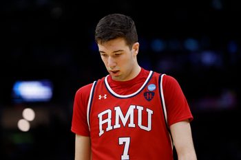 Mar 21, 2025; Cleveland, OH, USA; Robert Morris Colonials forward Alvaro Folgueiras (7) reacts in the second half against the Alabama Crimson Tide during the NCAA Tournament First Round at Rocket Arena. Mandatory Credit: Rick Osentoski-Imagn Images