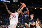 Mar 21, 2025; Seattle, WA, USA; Grand Canyon Antelopes guard Makaih Williams (2) shoots the ball while being defended by Maryland Terrapins forward Jordan Geronimo (22) in the second half at Climate Pledge Arena. Mandatory Credit: Steven Bisig-Imagn Images