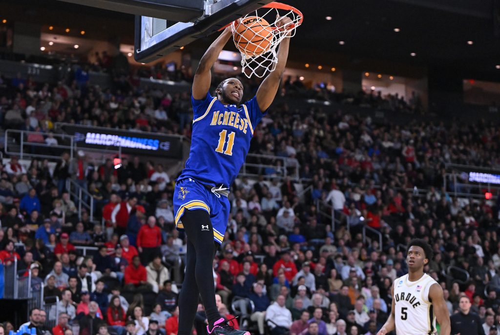 Mar 22, 2025; Providence, RI, USA; McNeese State Cowboys guard Quadir Copeland (11) dunks during the second half of a second round men’s NCAA Tournament game against the Purdue Boilermakers at Amica Mutual Pavilion. Mandatory Credit: Brian Fluharty-Imagn Images