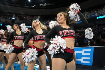 Mar 22, 2025; Wichita, KS, USA; Texas Tech Red Raiders cheerleaders perform before the game between the Texas Tech Red Raiders and the Drake Bulldogs at Intrust Bank Arena. Mandatory Credit: Kirby Lee-Imagn Images