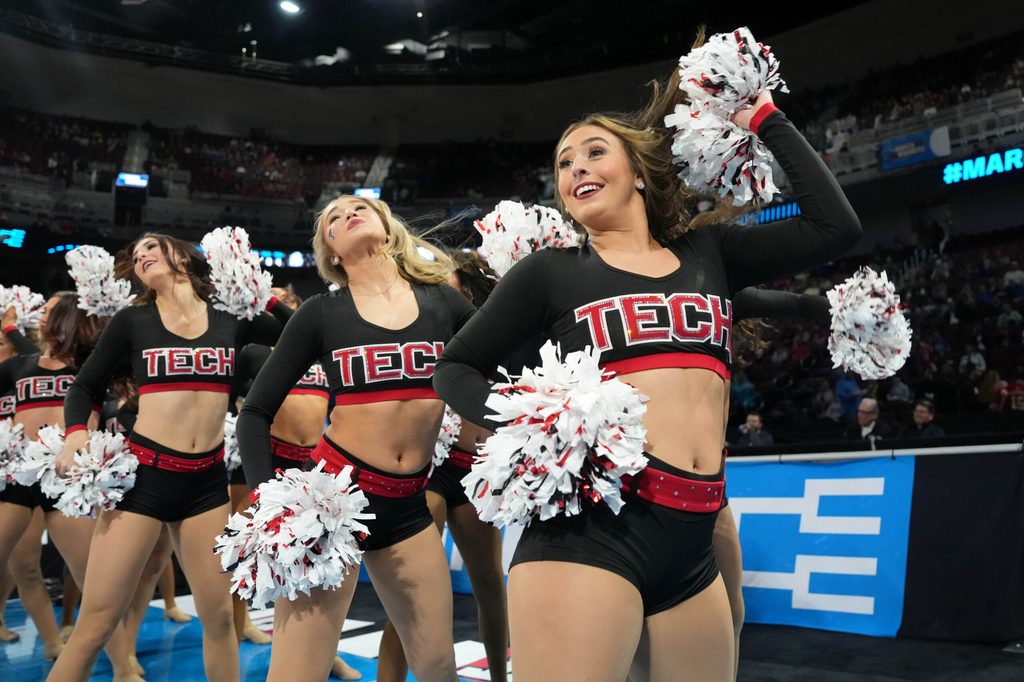 Mar 22, 2025; Wichita, KS, USA; Texas Tech Red Raiders cheerleaders perform before the game between the Texas Tech Red Raiders and the Drake Bulldogs at Intrust Bank Arena. Mandatory Credit: Kirby Lee-Imagn Images