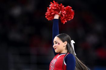 Mar 22, 2025; Providence, RI, USA; St. John's Red Storm cheerleaders perform during a second round men’s NCAA Tournament game against the Arkansas Razorbacks at Amica Mutual Pavilion. Mandatory Credit: Brian Fluharty-Imagn Images