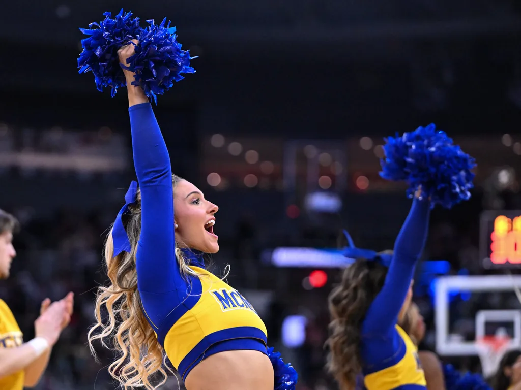 Mar 22, 2025; Providence, RI, USA; McNeese State Cowboys cheerleaders performs during a second round men’s NCAA Tournament game against the Purdue Boilermakers at Amica Mutual Pavilion. Mandatory Credit: Brian Fluharty-Imagn Images