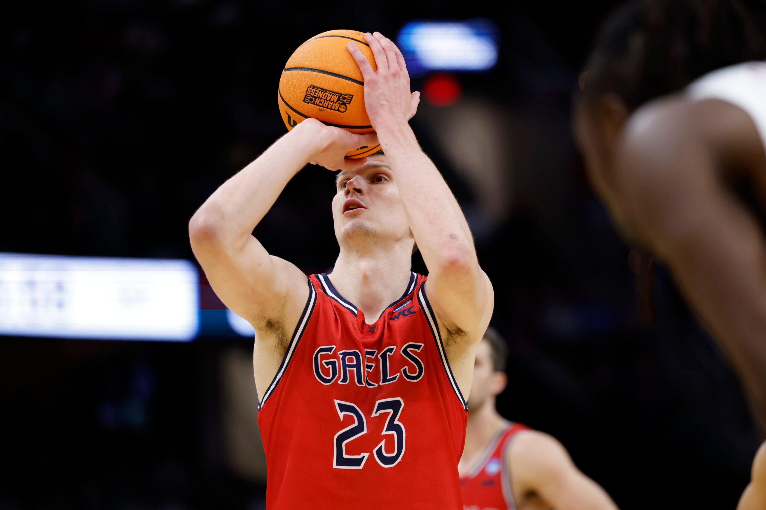 Mar 23, 2025; Cleveland, OH, USA; St. Mary's Gaels forward Paulius Murauskas (23) shoots the ball in the first half against the Alabama Crimson Tide during the NCAA Tournament Second Round at Rocket Arena. Mandatory Credit: Rick Osentoski-Imagn Images