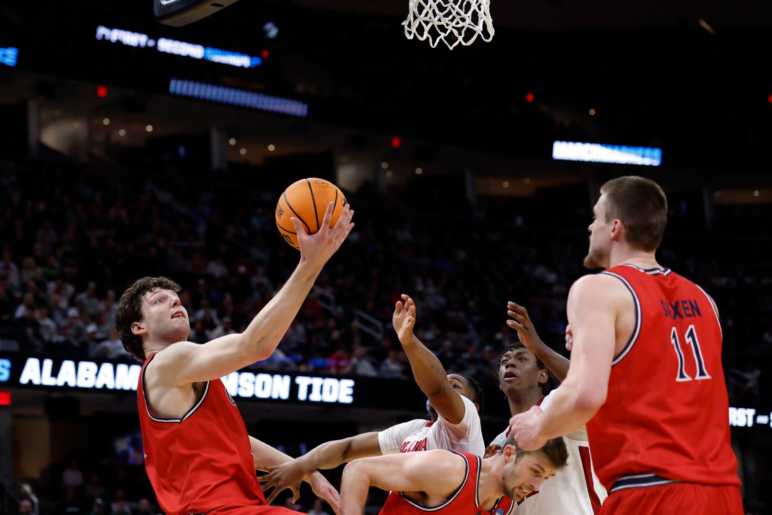 Mar 23, 2025; Cleveland, OH, USA; St. Mary's Gaels center Harry Wessels (1) collects the ball in the second half against the Alabama Crimson Tide during the NCAA Tournament Second Round at Rocket Arena. Mandatory Credit: Rick Osentoski-Imagn Images
