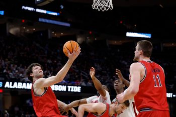 Mar 23, 2025; Cleveland, OH, USA; St. Mary's Gaels center Harry Wessels (1) collects the ball in the second half against the Alabama Crimson Tide during the NCAA Tournament Second Round at Rocket Arena. Mandatory Credit: Rick Osentoski-Imagn Images