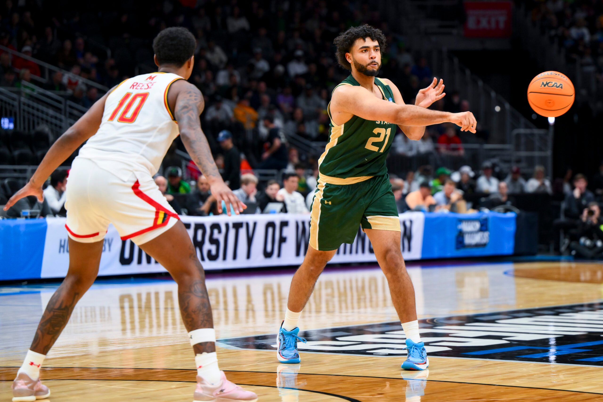 Mar 23, 2025; Seattle, WA, USA; Colorado State Rams forward Rashaan Mbemba (21) passes the ball against the Maryland Terrapins in the first half at Climate Pledge Arena. Mandatory Credit: Steven Bisig-Imagn Images