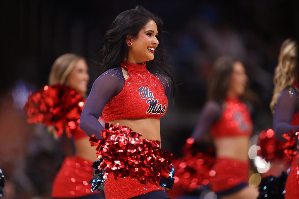 Mar 28, 2025; Atlanta, GA, USA; Mississippi Rebels cheerleaders in the first half of a South Regional semifinal of the 2025 NCAA tournament against the Michigan State Spartans at State Farm Arena. Mandatory Credit: Brett Davis-Imagn Images