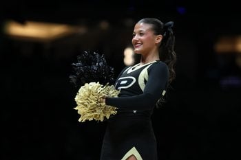 Mar 28, 2025; Indianapolis, IN, USA; The Purdue Boilermakers cheerleaders perform in the first half during a Midwest Regional semifinal of the 2025 NCAA tournament at Lucas Oil Stadium. Mandatory Credit: Trevor Ruszkowski-Imagn Images