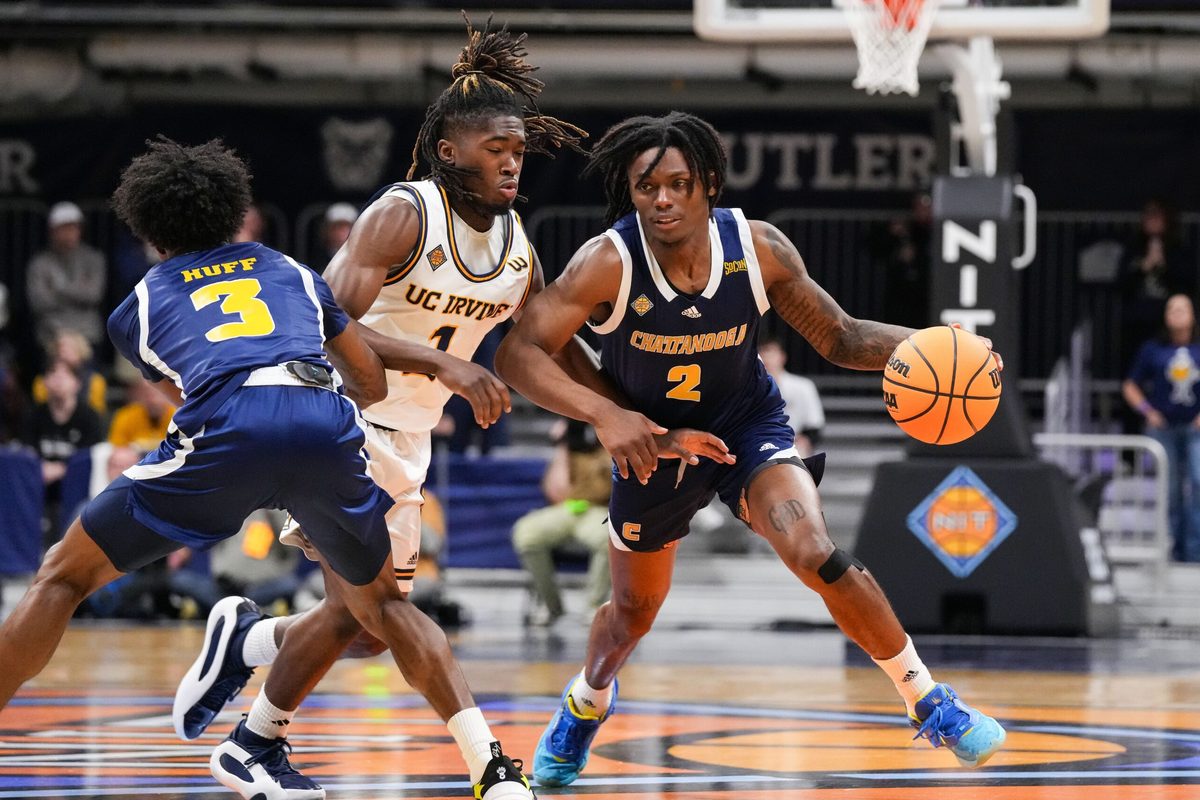 Chattanooga Mocs guard Trey Bonham (2) rushes up the court Thursday, April 3, 2025, during the National Invitional Tournament at Hinkle Fieldhouse in Indianapolis.