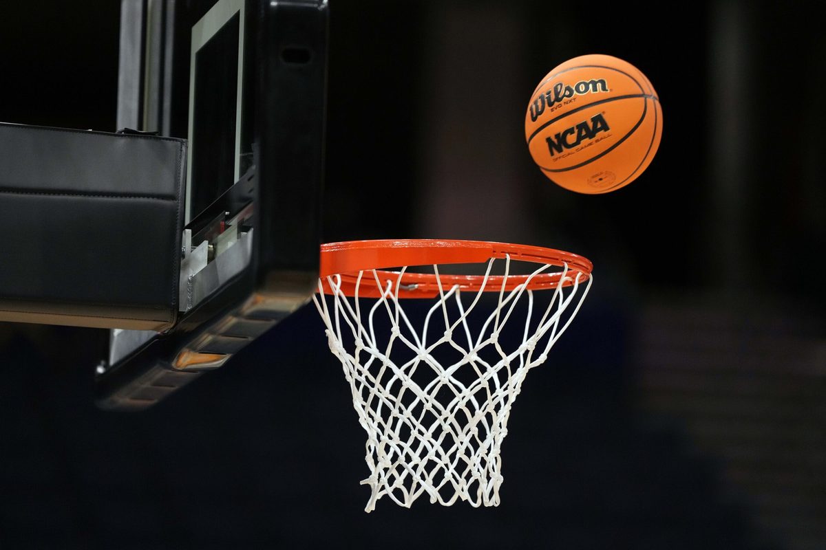 Apr 3, 2025; Tampa, FL, USA; A Wilson EVO Nxt basketball ball with the 2025 NCAA Women's Final Four logo approaches the rim and the net at Amalie Arena. Mandatory Credit: Kirby Lee-Imagn Images