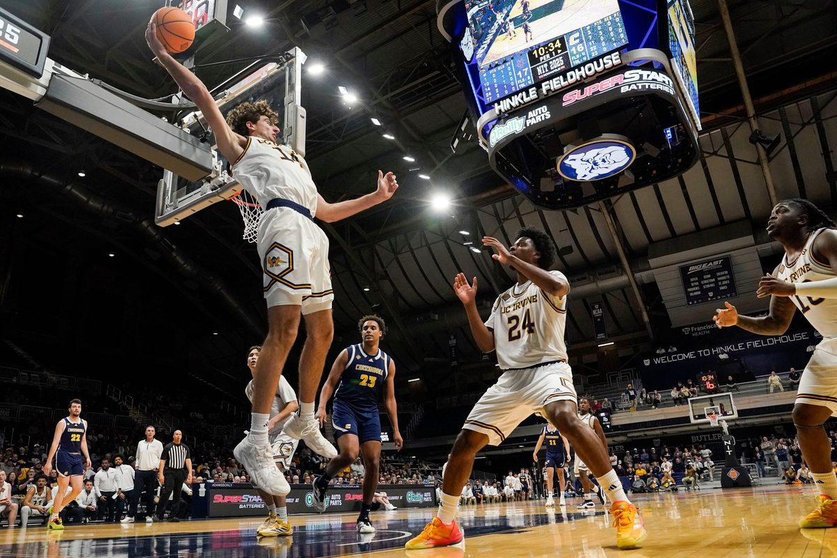 UC Irvine Anteaters forward Kyle Evans (14) throws the ball back in bounds to UC Irvine Anteaters guard Jurian Dixon (24) on Thursday, April 3, 2025, during the National Invitational Tournament at Hinkle Fieldhouse in Indianapolis.